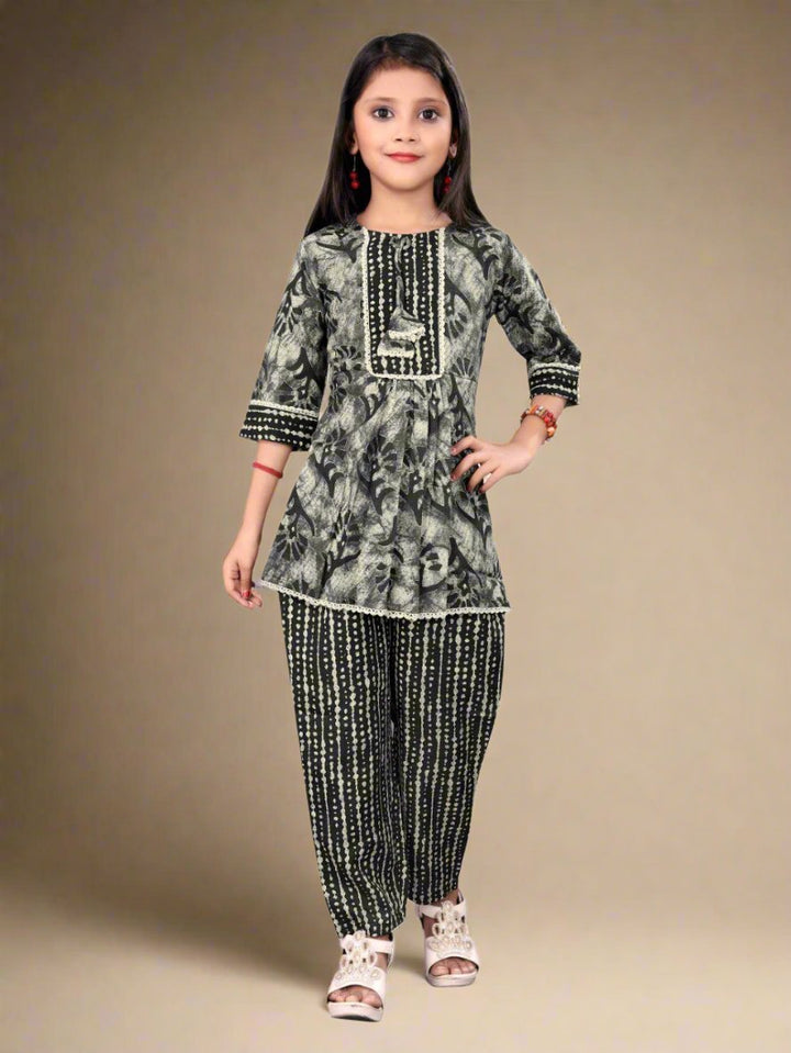girl posing in Baby ethnic dress in studio lighting