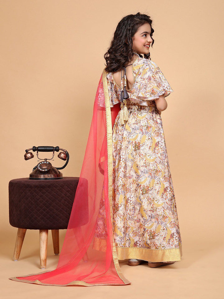 girl posing in choli with red dupatta
